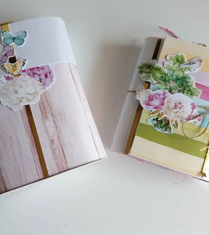 Mini álbum de scrap con esquinas redondeadas y caja a juego, decorados con flores y mariposas de colores
