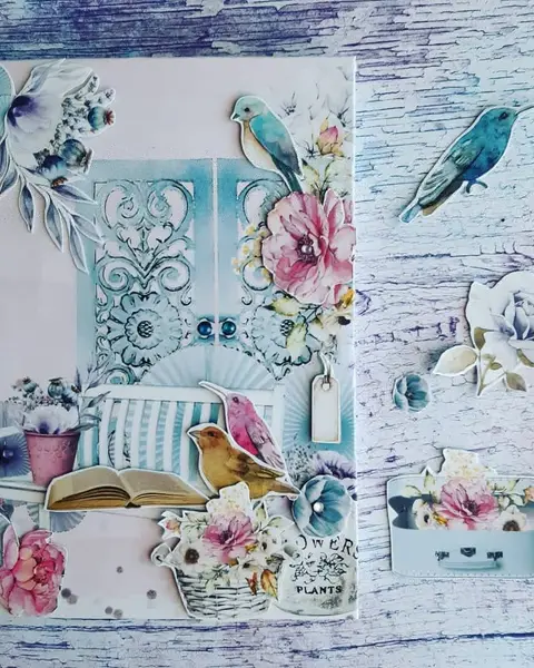 Libreta de anillas con portada de pájaros y ramas en papel de scrap, tonos azules y verdes