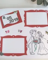 Detalle de los papeles y adornos de una página del libro de firmas